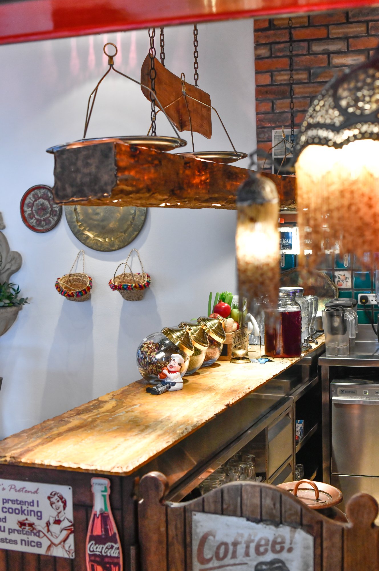 Villa Mamas Bahrain kitchen counter with spice jars and vintage decor